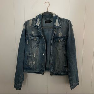 Distressed jean jacket